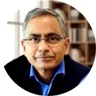 Dr. Kishore Paknikar